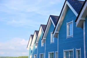 Row Of New Rental House In Blue Paint